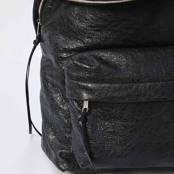 Close-up of Balenciaga backpacks hardware and fine stitching