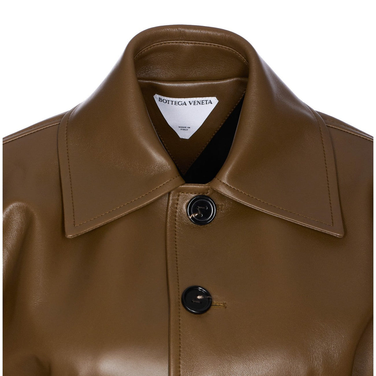 Close-up of Bottega Veneta coats hardware and fine stitching