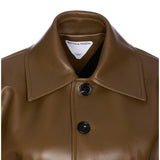 Close-up of Bottega Veneta coats hardware and fine stitching