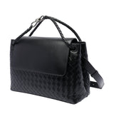 Close-up of Bottega Veneta cross body bags hardware and fine stitching