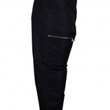 Close-up of Alexander McQueen pants hardware and fine stitching