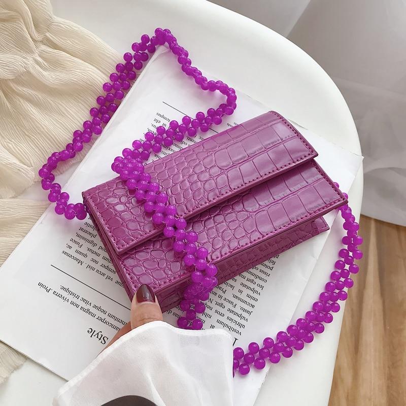 Velouxe Women's Mini Handbag detail shot – authentic designer craftsmanship