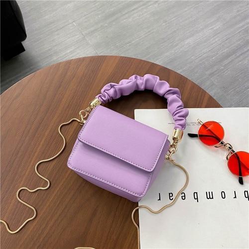 Velouxe Women's Mini Handbag detail shot – authentic designer craftsmanship