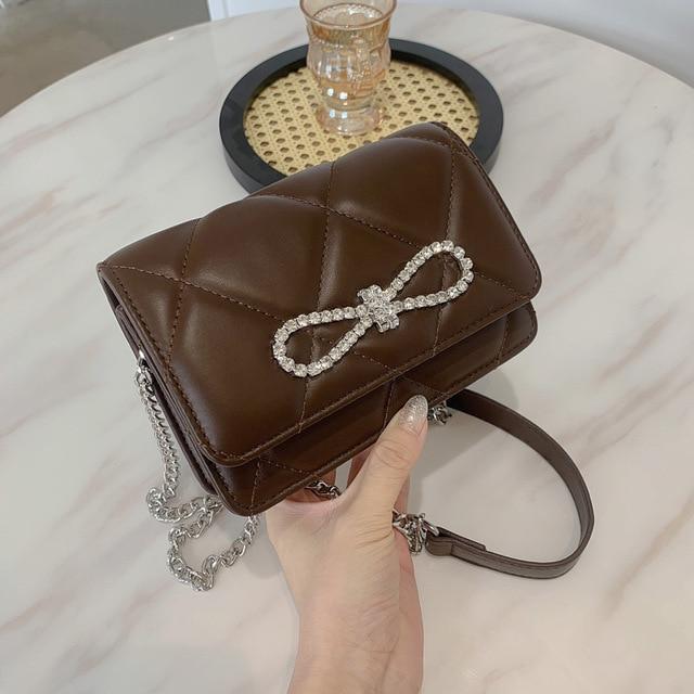 Velouxe Women's Mini Handbag detail shot – authentic designer craftsmanship