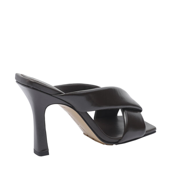 Close-up of Bottega Veneta sandals hardware and fine stitching