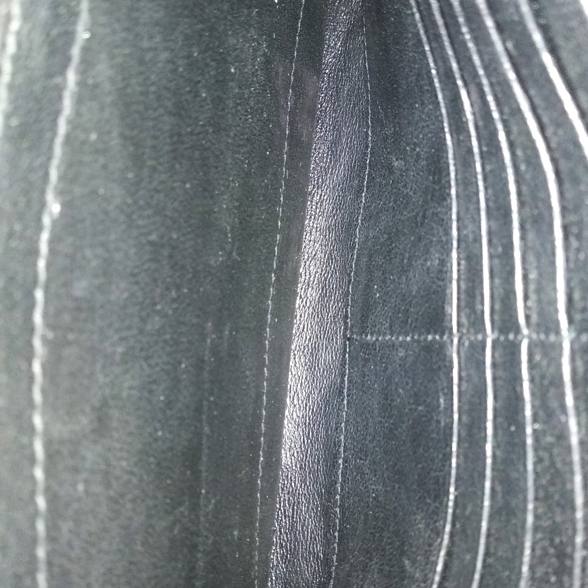 Close-up of Becky bags hardware and fine stitching