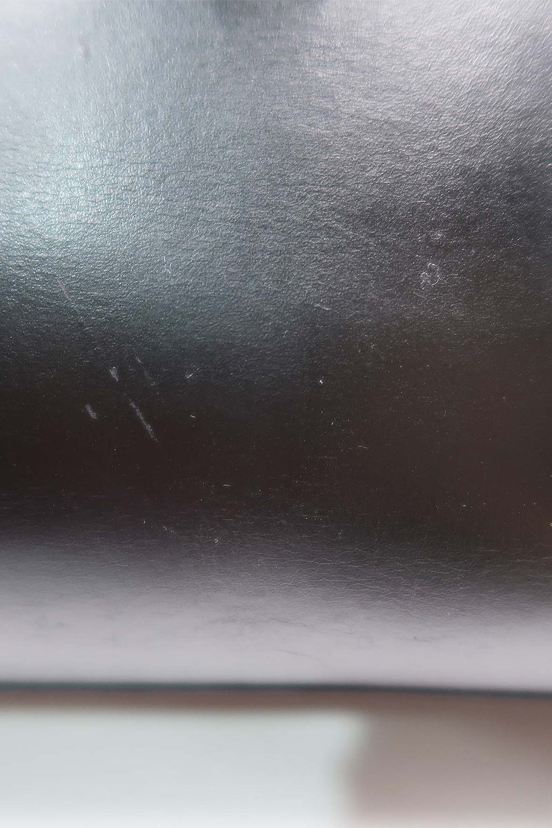 Close-up of Cassandre bags hardware and fine stitching