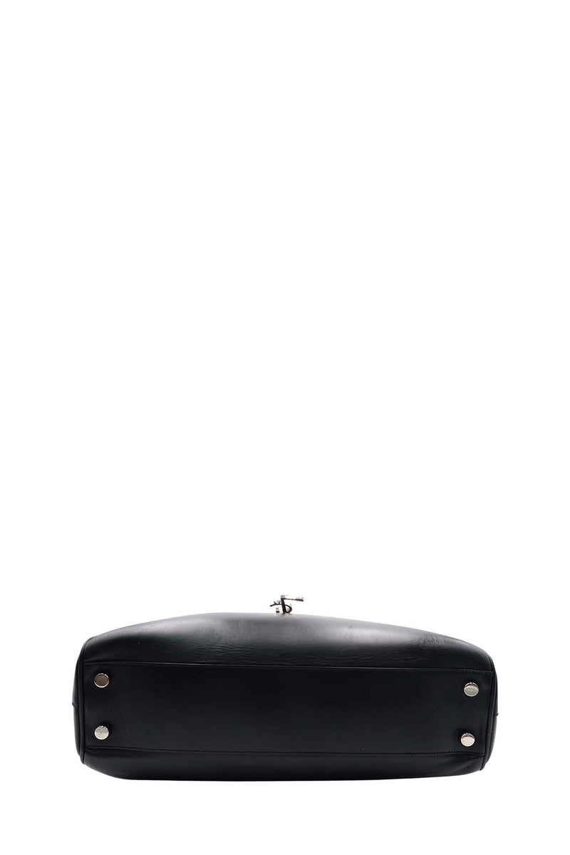 Close-up of Cassandre bags hardware and fine stitching