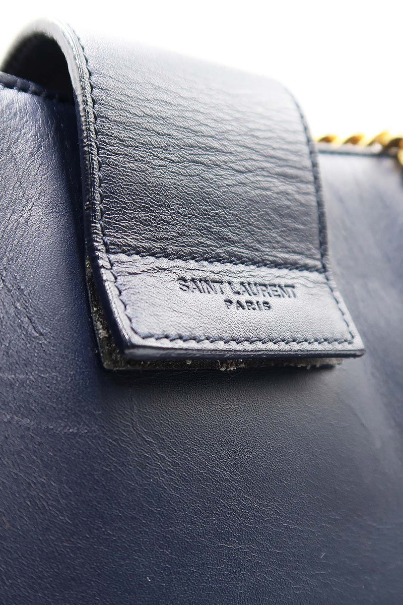 Close-up of Cassandre bags hardware and fine stitching