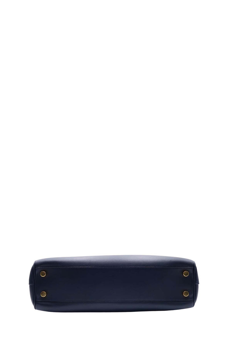 Close-up of Cassandre bags hardware and fine stitching