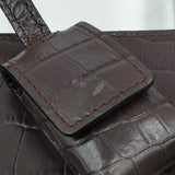 Close-up of Classic bags hardware and fine stitching