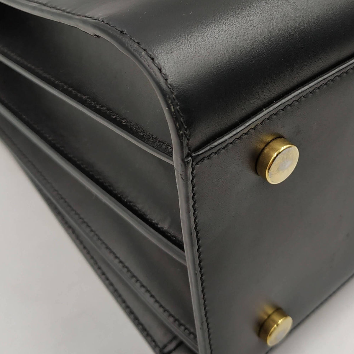 Close-up of Classic bags hardware and fine stitching