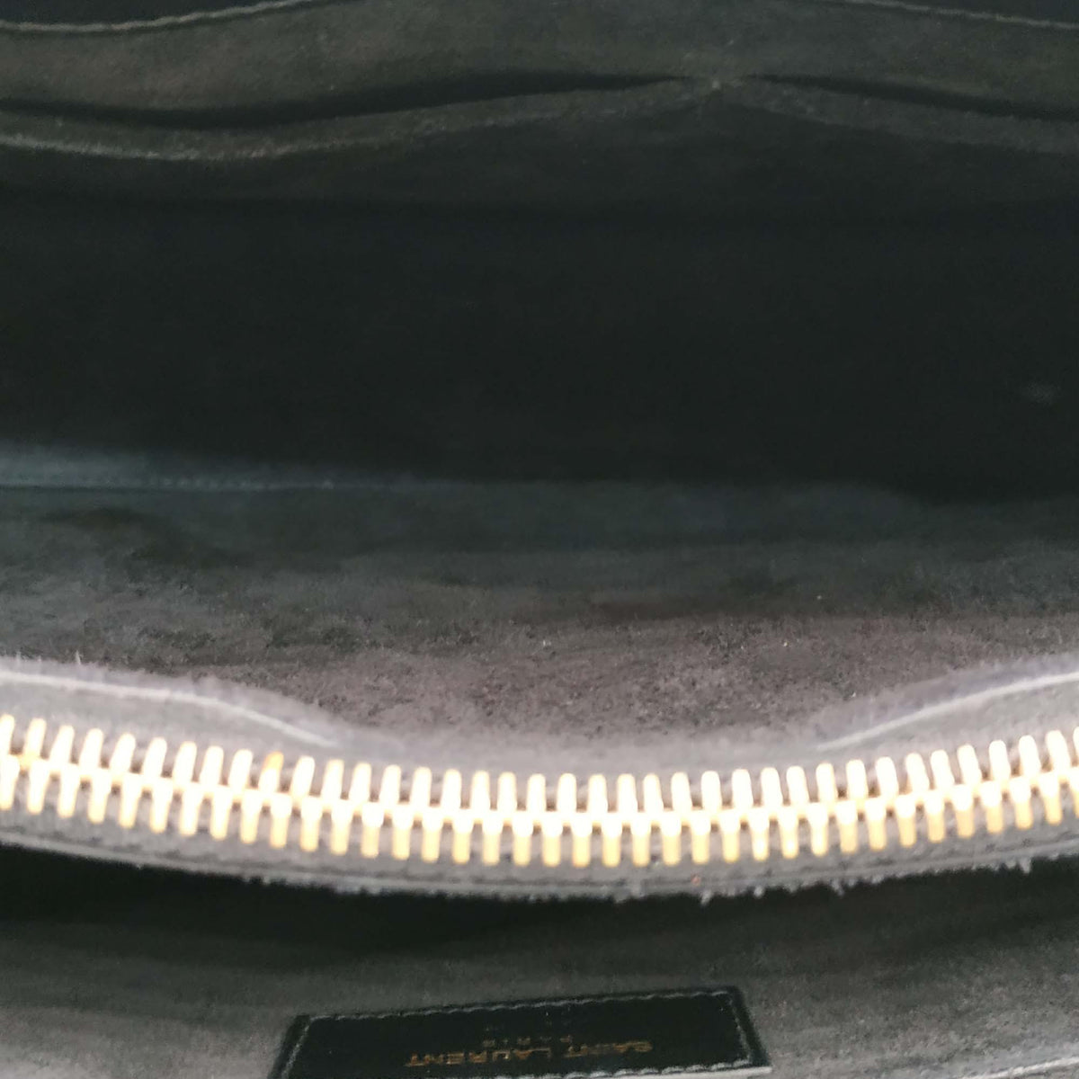 Close-up of Classic bags hardware and fine stitching