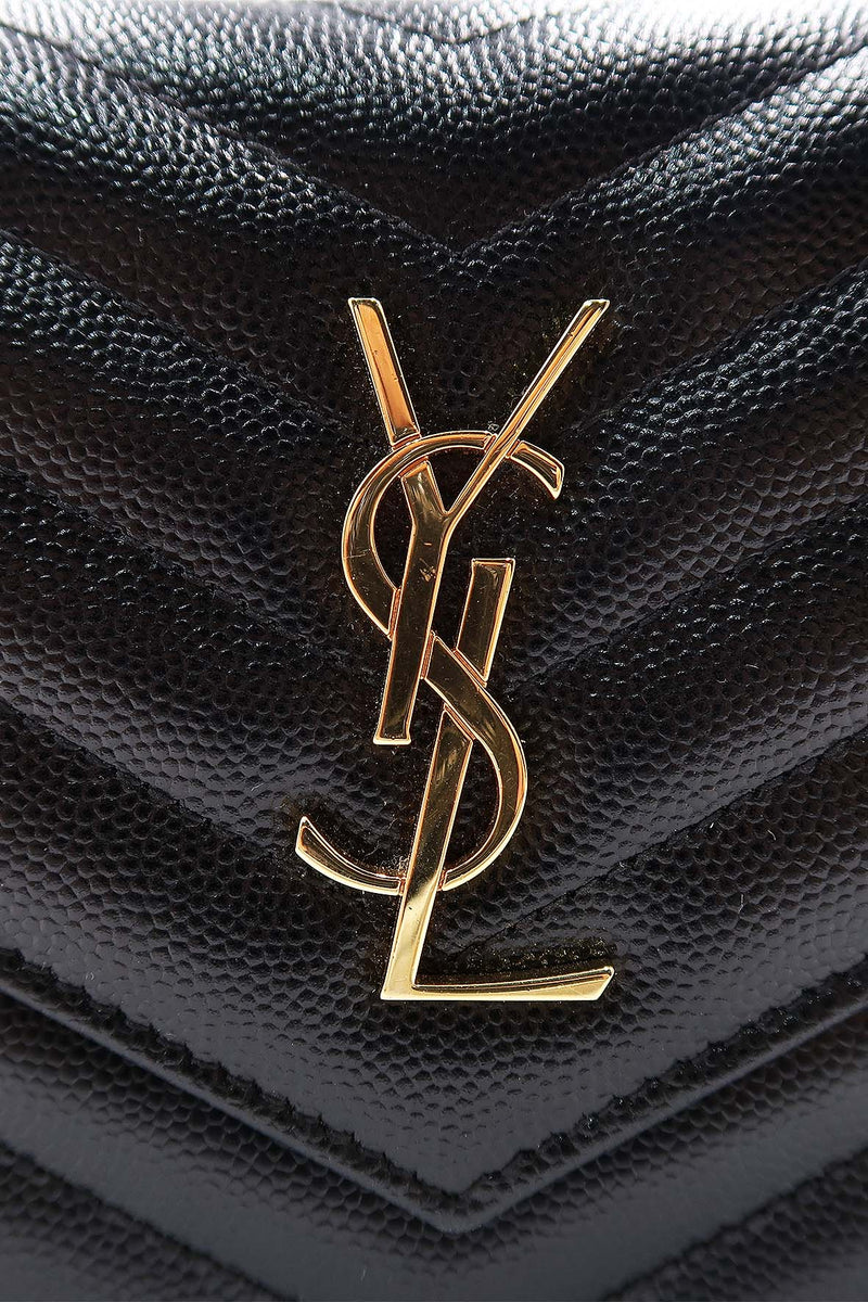 Close-up of Envelope bags hardware and fine stitching