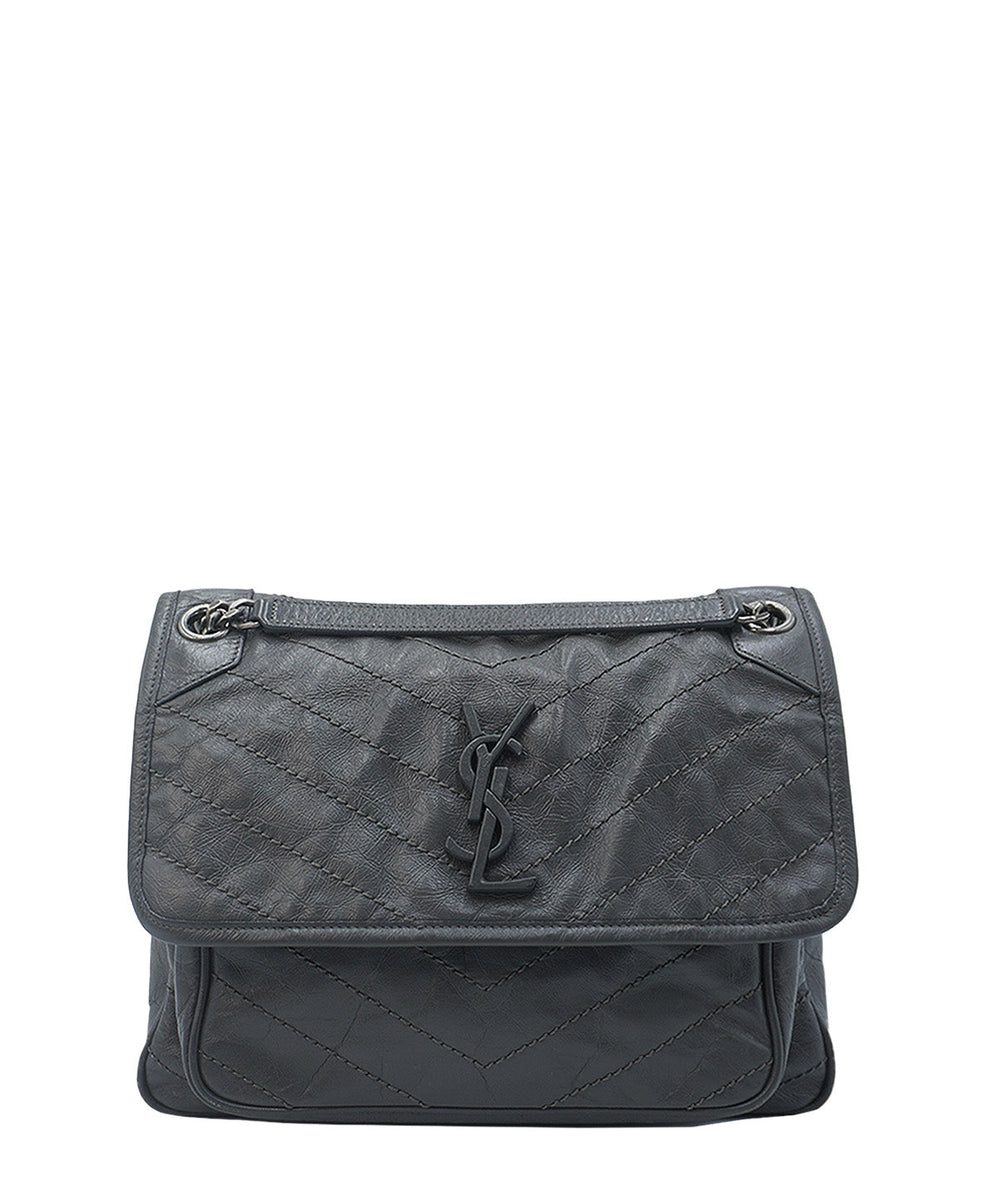 Large bags luxury designer piece front view