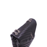 Close-up of Loulou bags hardware and fine stitching