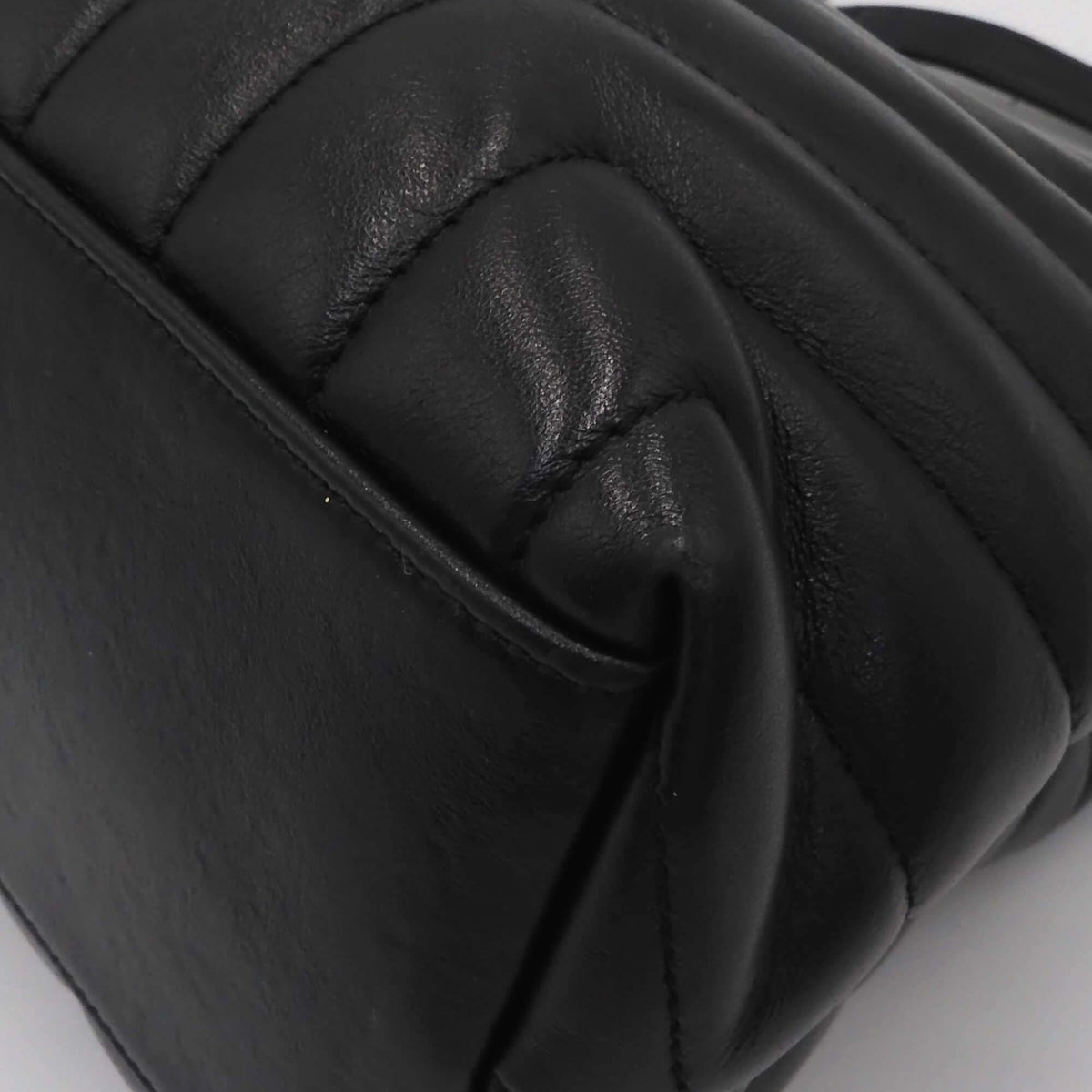 Close-up of Loulou bags hardware and fine stitching