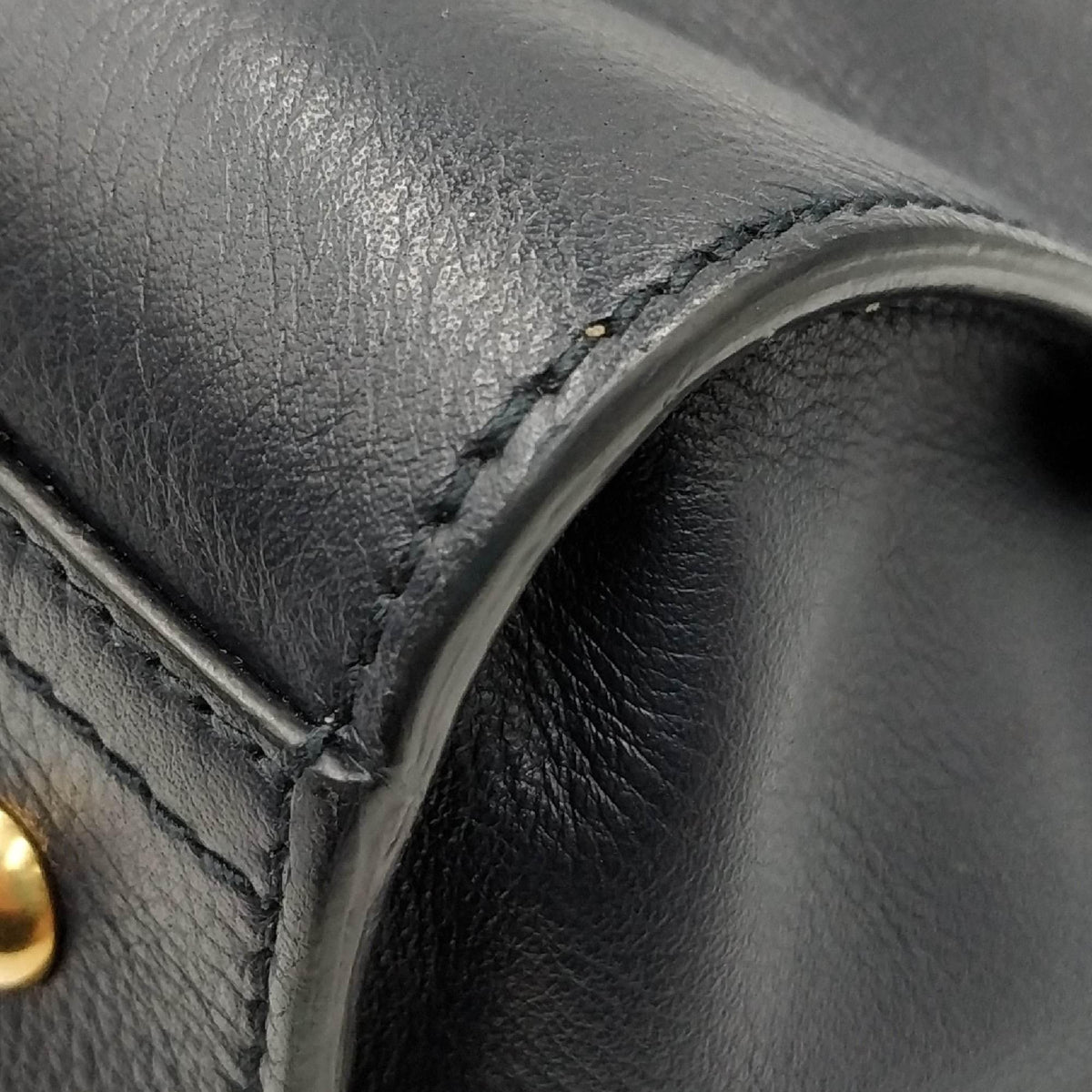 Close-up of Medium bags hardware and fine stitching