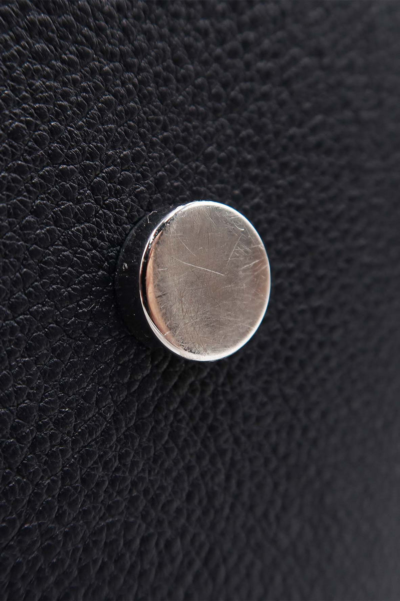 Close-up of Medium bags hardware and fine stitching