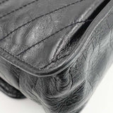 Close-up of Medium bags hardware and fine stitching