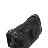Close-up of Medium bags hardware and fine stitching