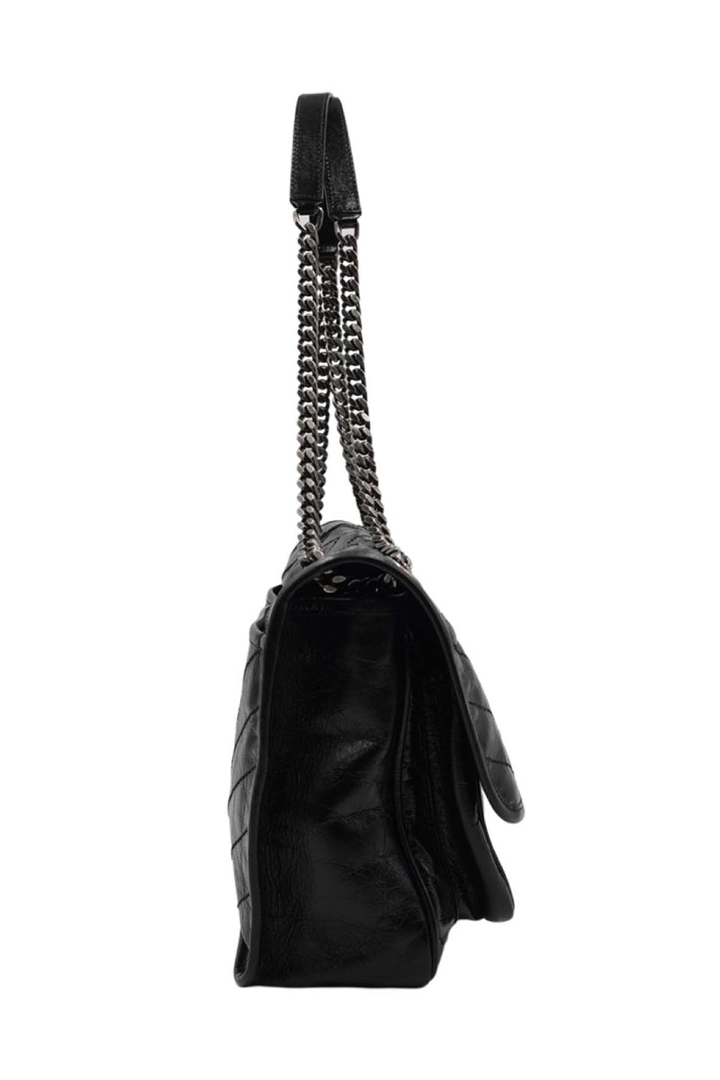 Medium bags lifestyle shot premium designer piece