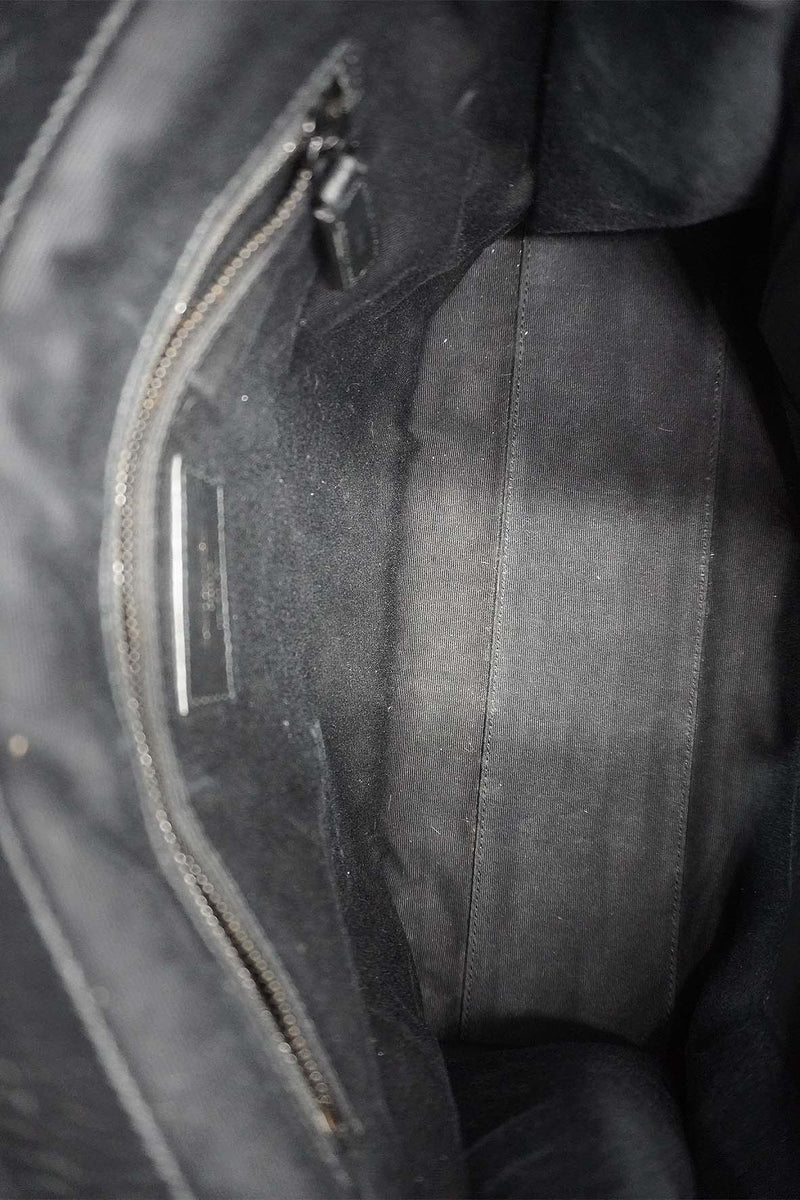 Close-up of Medium bags hardware and fine stitching