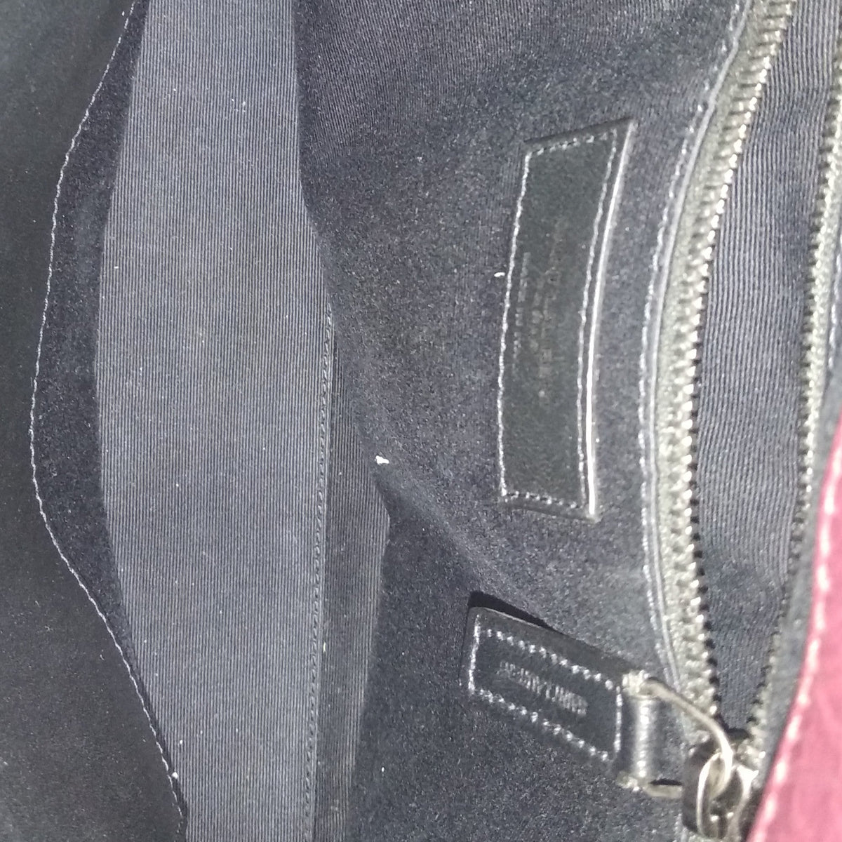 Close-up of Medium bags hardware and fine stitching