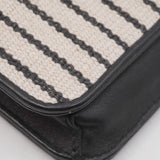 Close-up of Monogram bags hardware and fine stitching