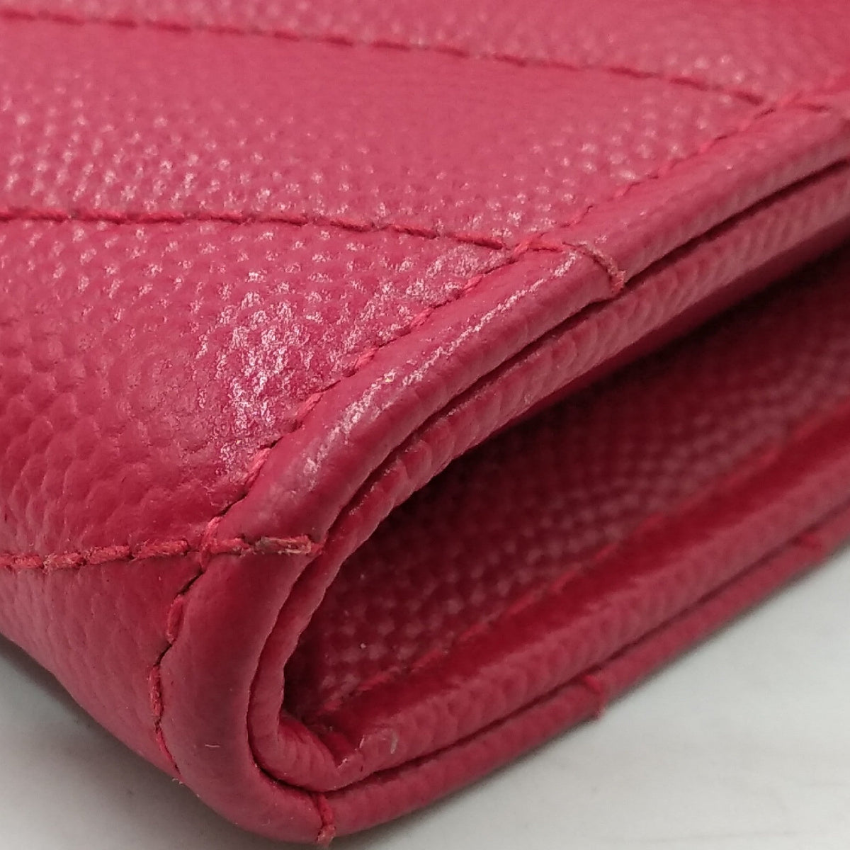 Close-up of Monogram bags hardware and fine stitching