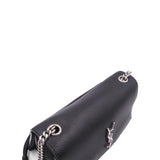 Close-up of Monogram bags hardware and fine stitching