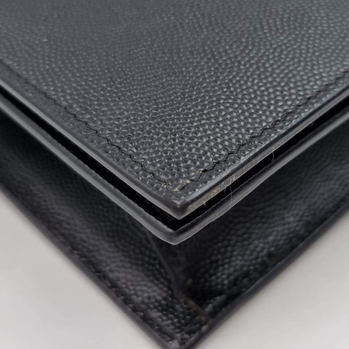 Monogram premium bags detail and craftsmanship close-up