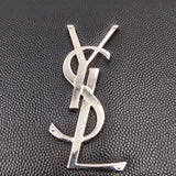 Monogram premium bags detail and craftsmanship close-up