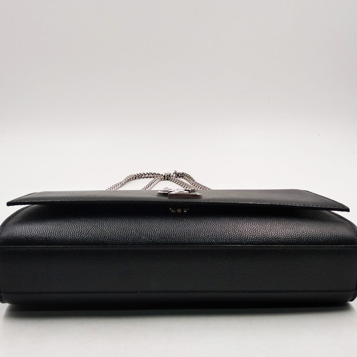 Close-up of Monogram bags hardware and fine stitching