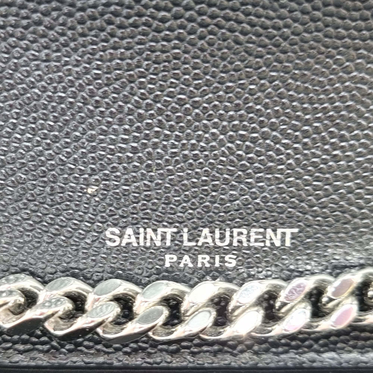 Close-up of Monogram bags hardware and fine stitching