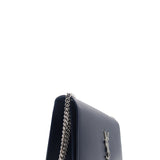 Close-up of Monogram bags hardware and fine stitching