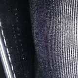 Close-up of Monogram bags hardware and fine stitching