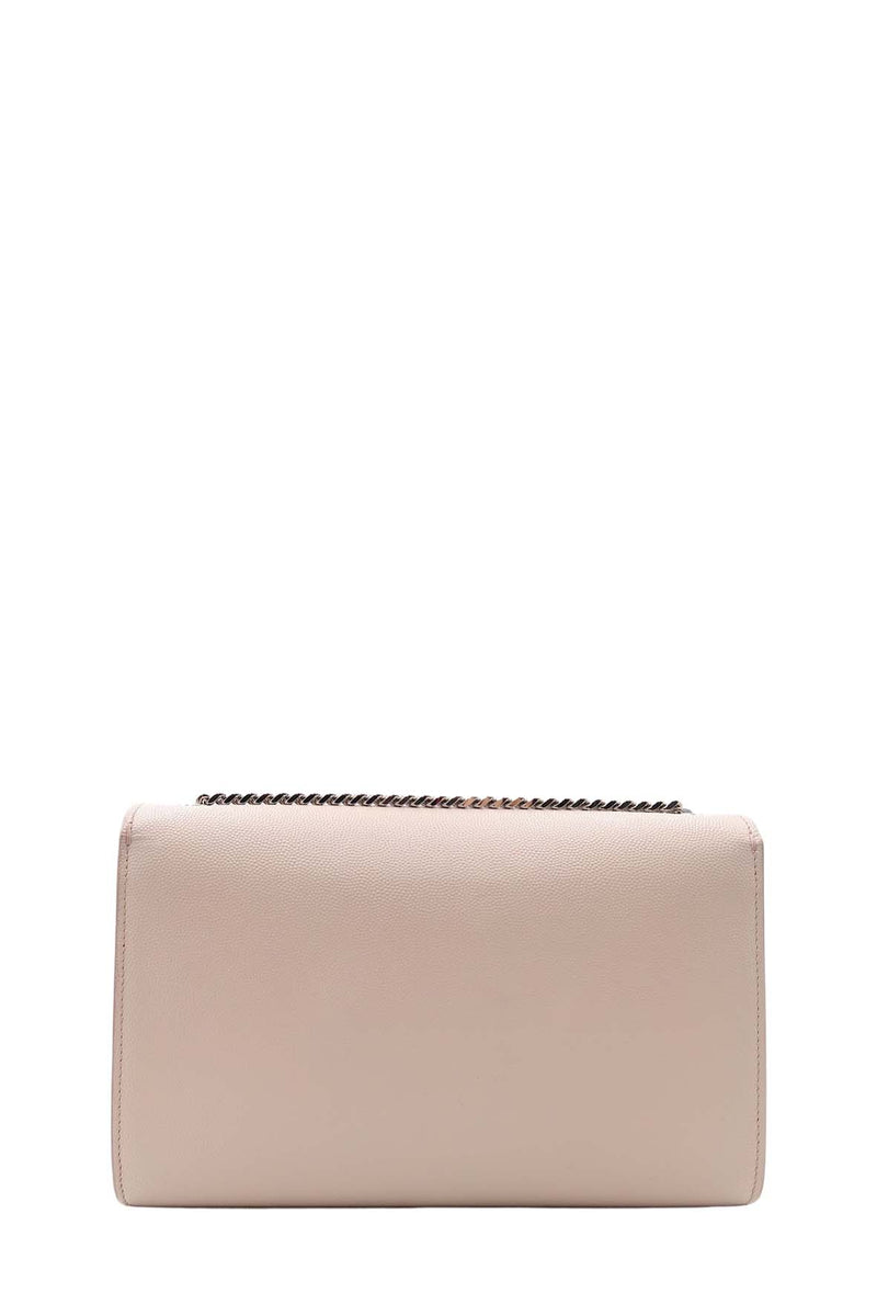 Close-up of Monogram bags hardware and fine stitching