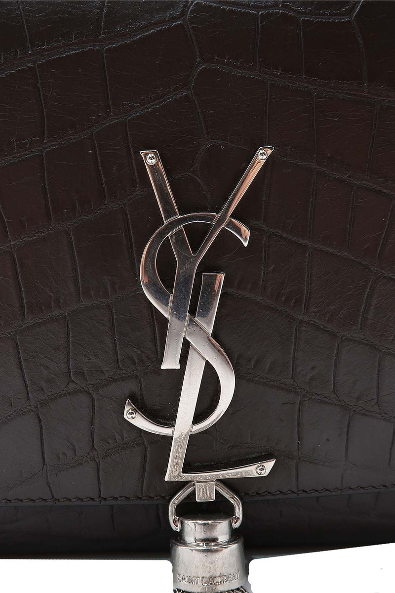 Close-up of Monogram bags hardware and fine stitching