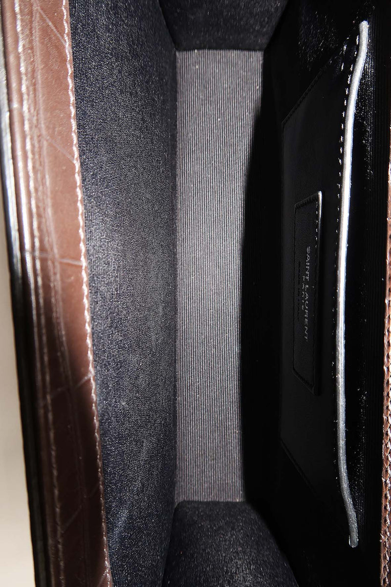 Close-up of Monogram bags hardware and fine stitching