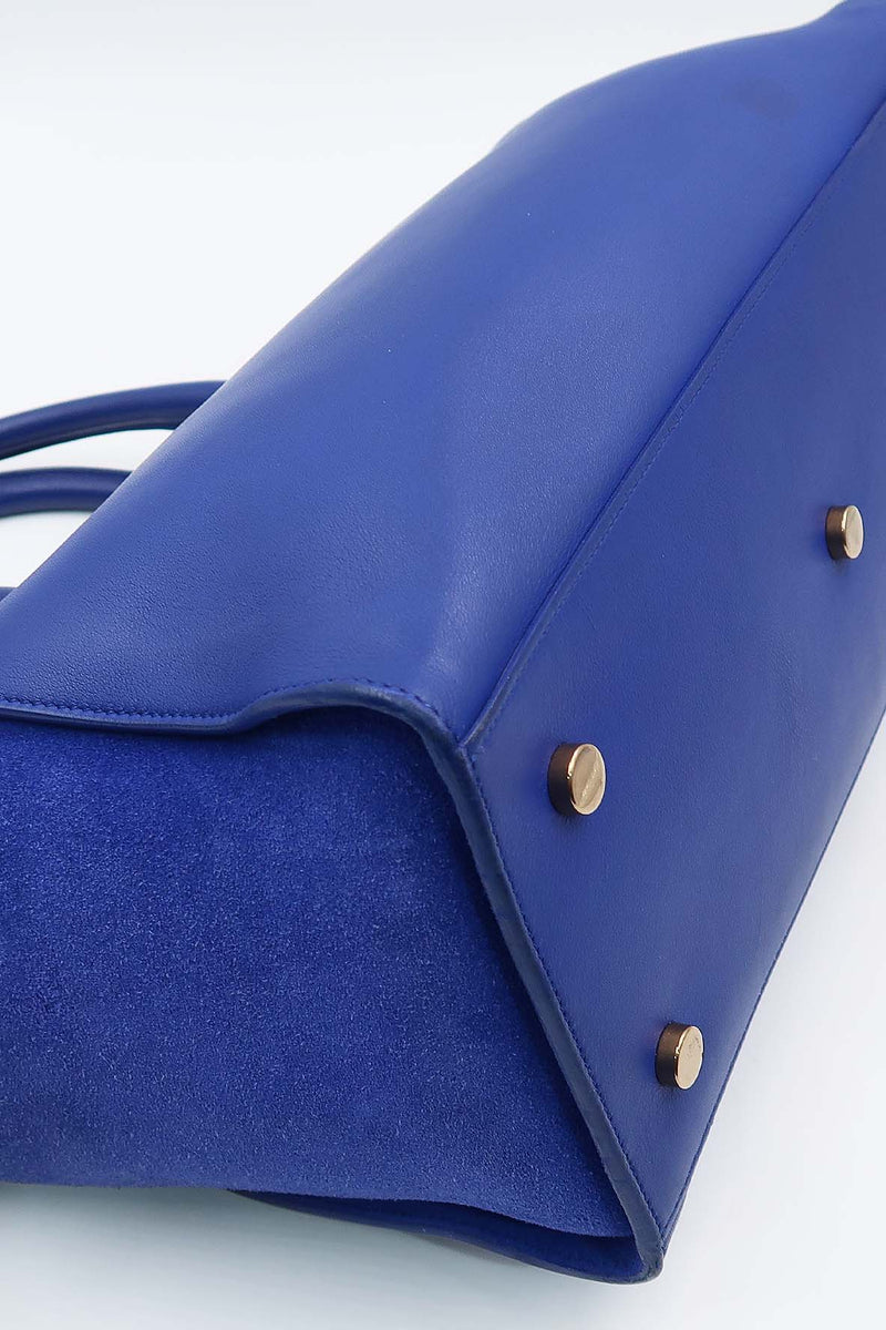 Close-up of Monogram bags hardware and fine stitching