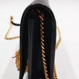 Close-up of Monogram bags hardware and fine stitching