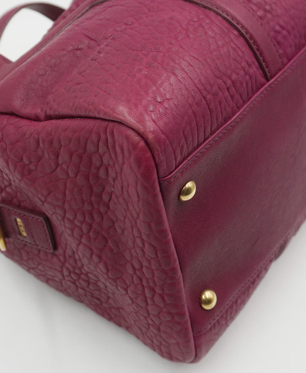 Pebbled premium bags detail and craftsmanship close-up