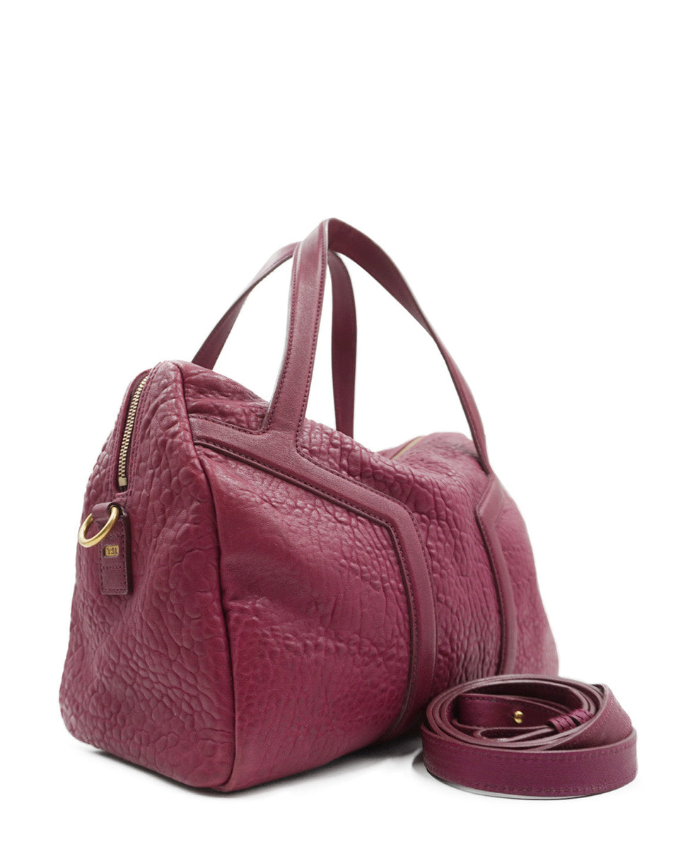 Pebbled bags side profile designer luxury fashion