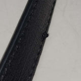 Close-up of Classic bags hardware and fine stitching