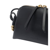 Close-up of Bottega Veneta clutches hardware and fine stitching
