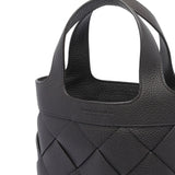 Close-up of Bottega Veneta totes hardware and fine stitching