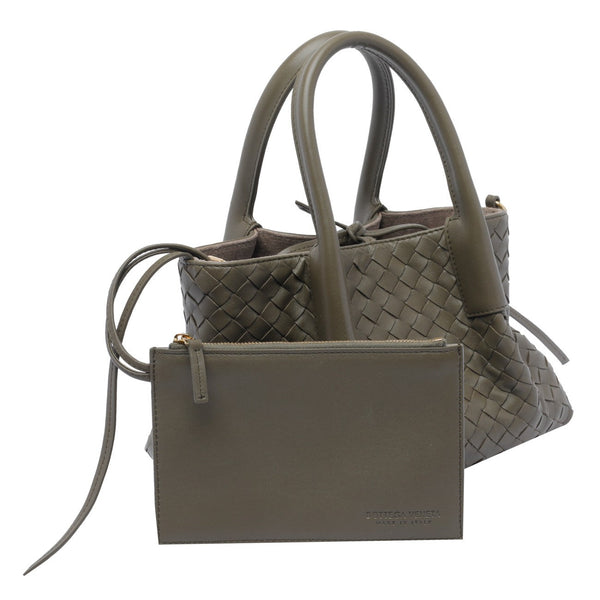 Close-up of Bottega Veneta totes hardware and fine stitching