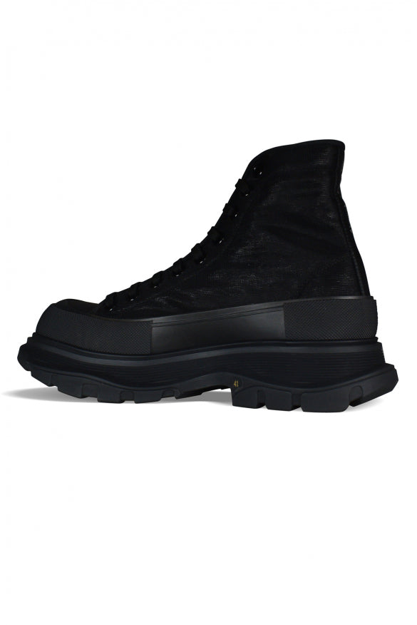 Alexander McQueen athletic side profile designer luxury fashion
