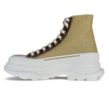 Close-up of Alexander McQueen athletic hardware and fine stitching